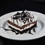 Layered Chocolate Dessert also known as Chocolate Lasagna made in an 8-inch square pan.