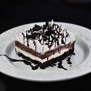 Layered Chocolate Dessert also known as Chocolate Lasagna made in an 8-inch square pan.