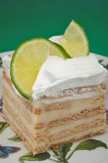 Slice of key lime icebox cake made with graham crackers and condensed milk.