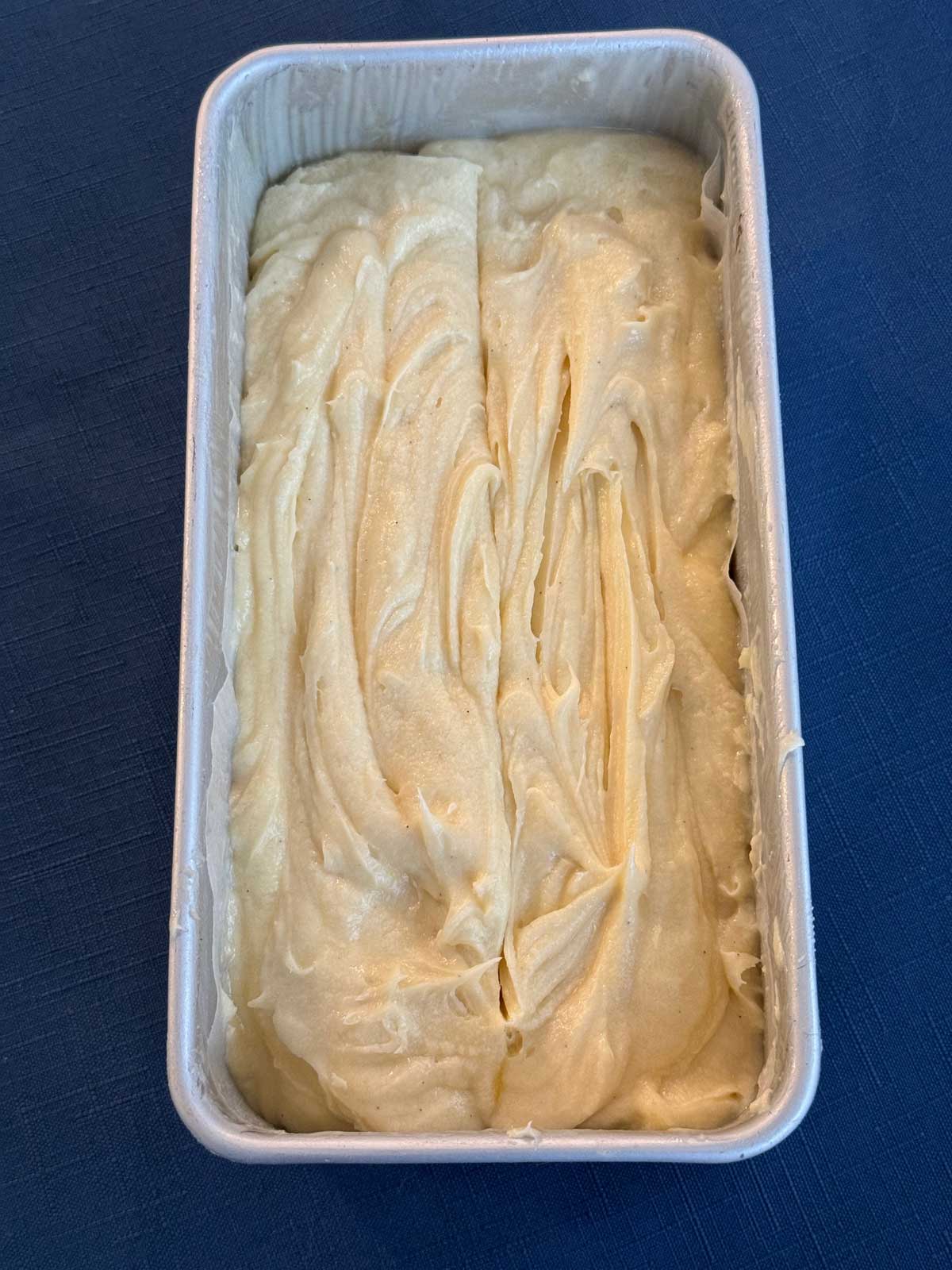 Batter in the loaf pan for Imperial Pound Cake recipe made with powdered sugar and butter instead of margarine.