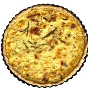 Classic Quiche Lorraine without onions or vegetables baked in a 9 inch removable bottom tart pan.