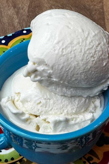 Recipe for coconut ice cream flavored with steeped coconut and coconut milk.