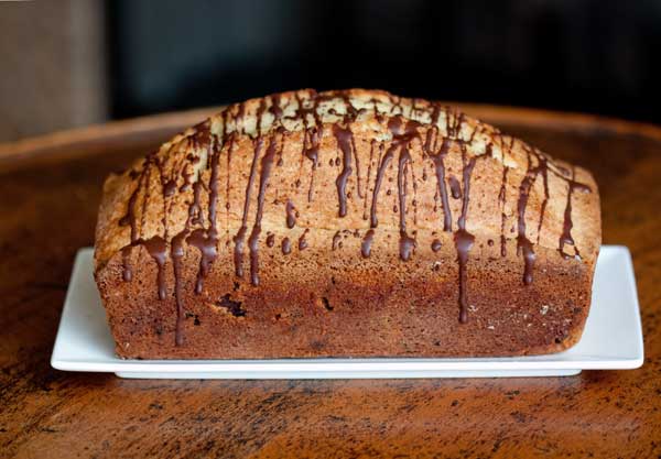 Mini chocolate chip cream cake baked in a loaf pan.