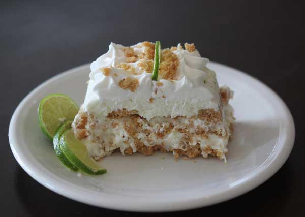 A piece of Coconut Lime Ice Cream Loaf on a plate.
