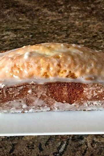 Glazed Adams Extract Pound cake made with the recipe on the back of the box.