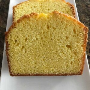 Vanilla Sour Cream Pound Cake flavored with a little McCormick Cake Mix Flavor and baked in a loaf pan.