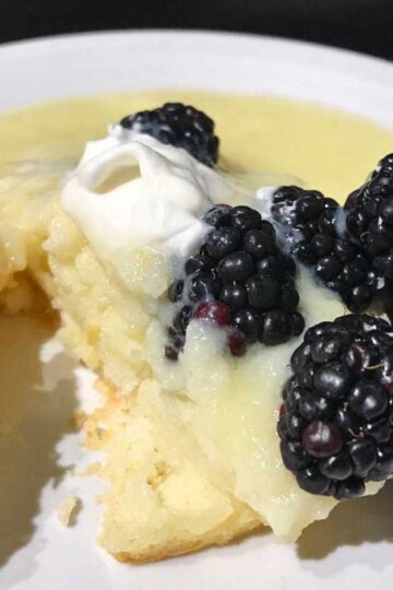 Individual lemon pudding cakes baked in ramekins.
