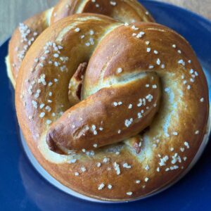 Recipe for fluffy sourdough discard pretzels.