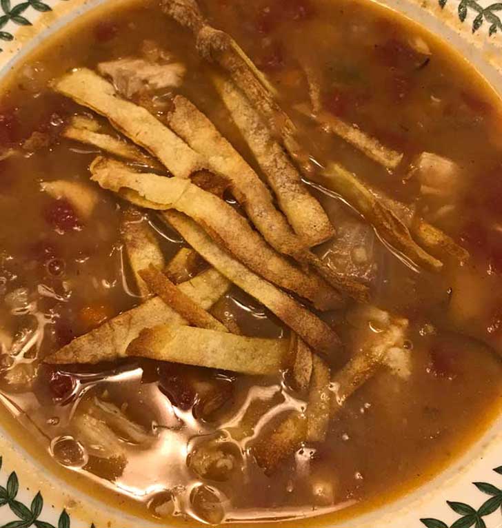Junior League of Austin Spicy Chicken Tortilla Soup recipe.