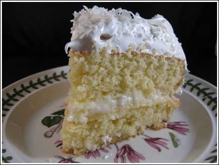 Slice of Small Coconut Layer Cake on a Porteirion plate.