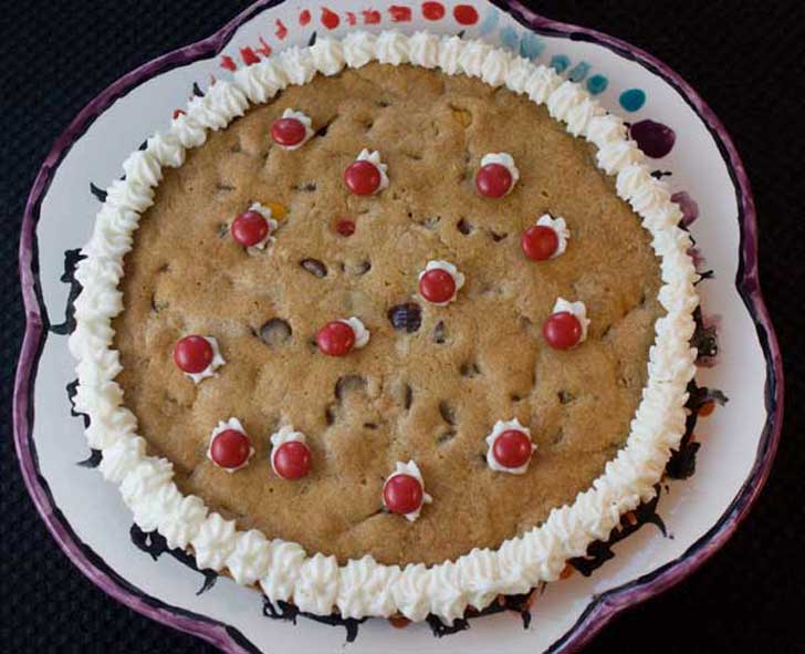 Festive giant chocolate chip cookie cake