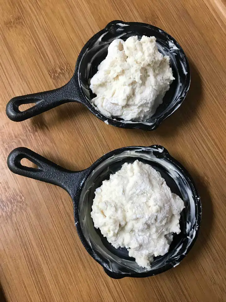 Drop biscuit dough in a 3.5 inch cast iron skillet.