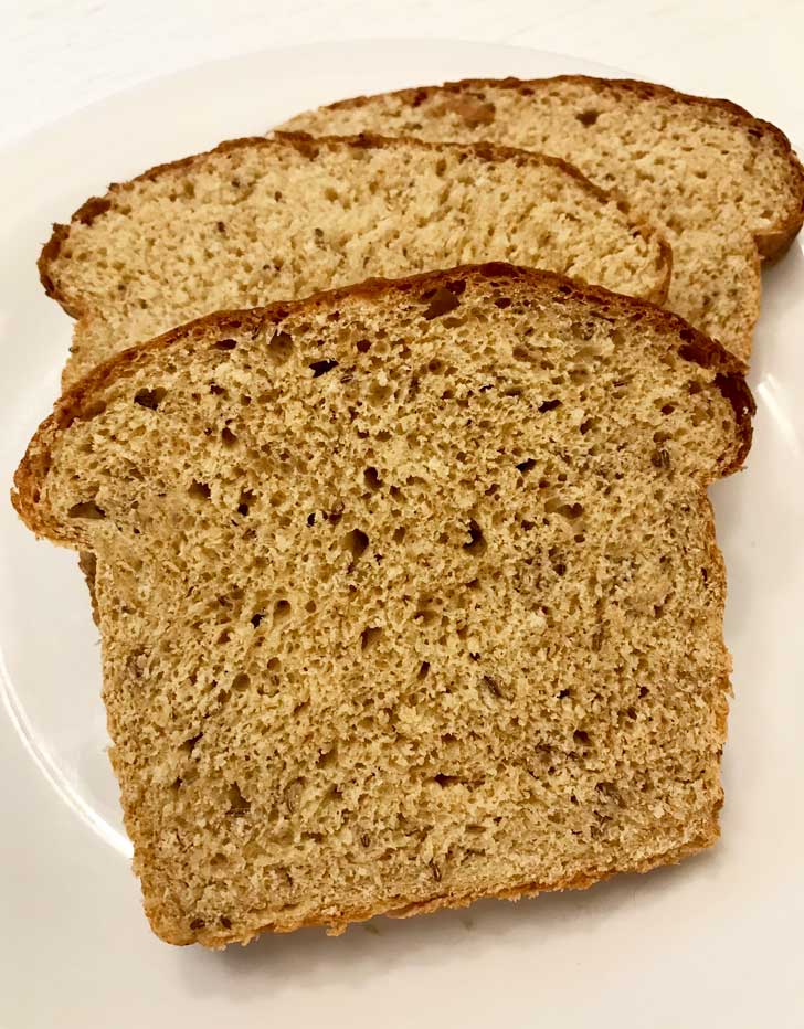 Sliced Caraway Cottage Cheese Bread with tasty wheat germ!