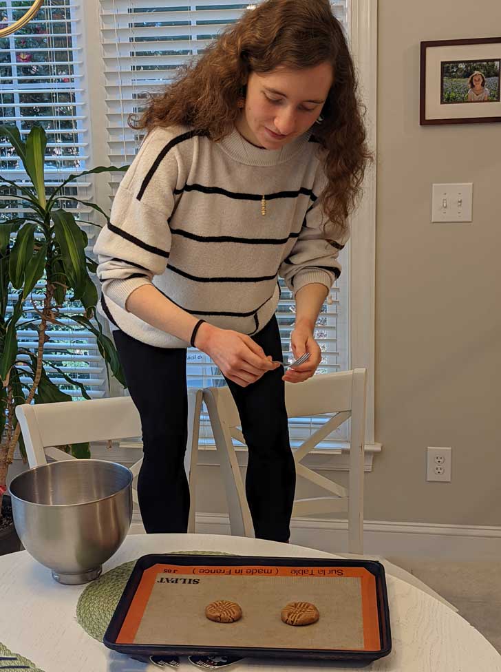 Grown up Fuzz making Flourless Peanut Butter Cookies.