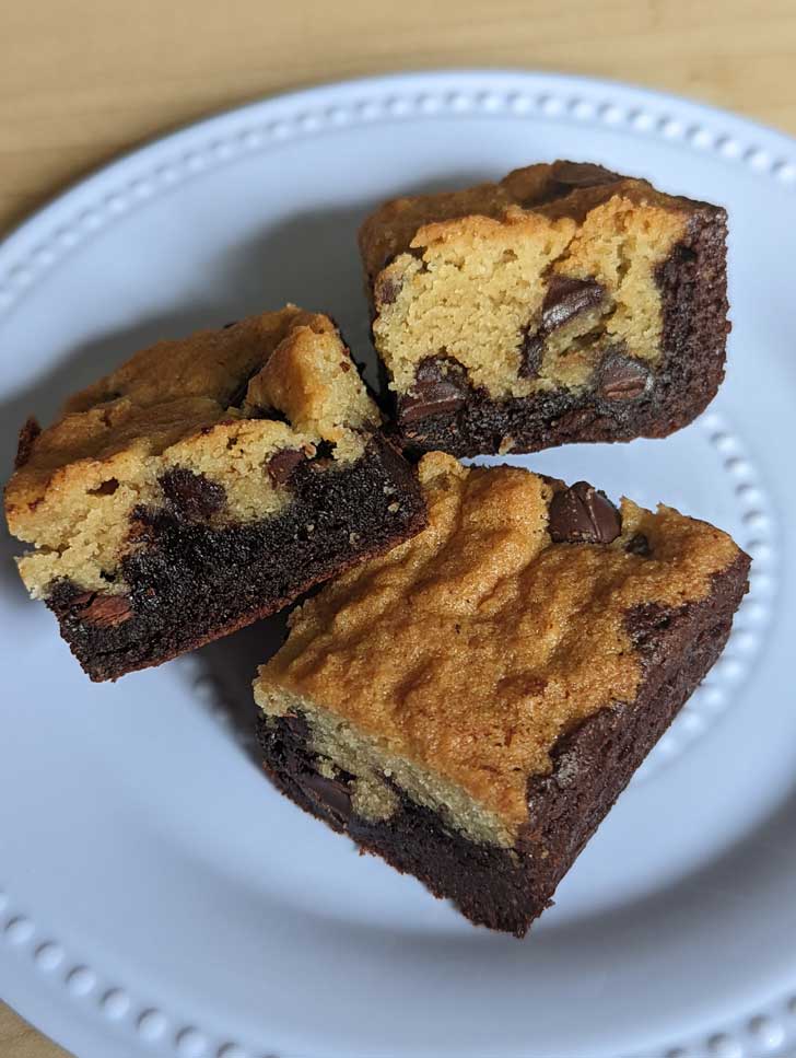 Almond Flour Brookies stacked on a white plate.