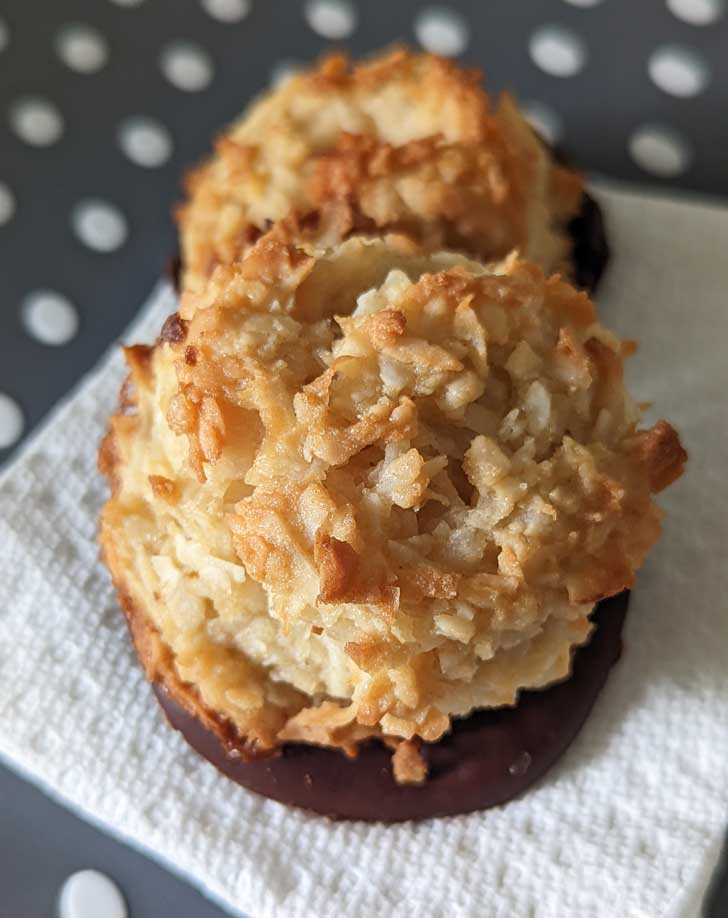 Two Gluten-Free Vegan Macaroons sitting on a napkin.