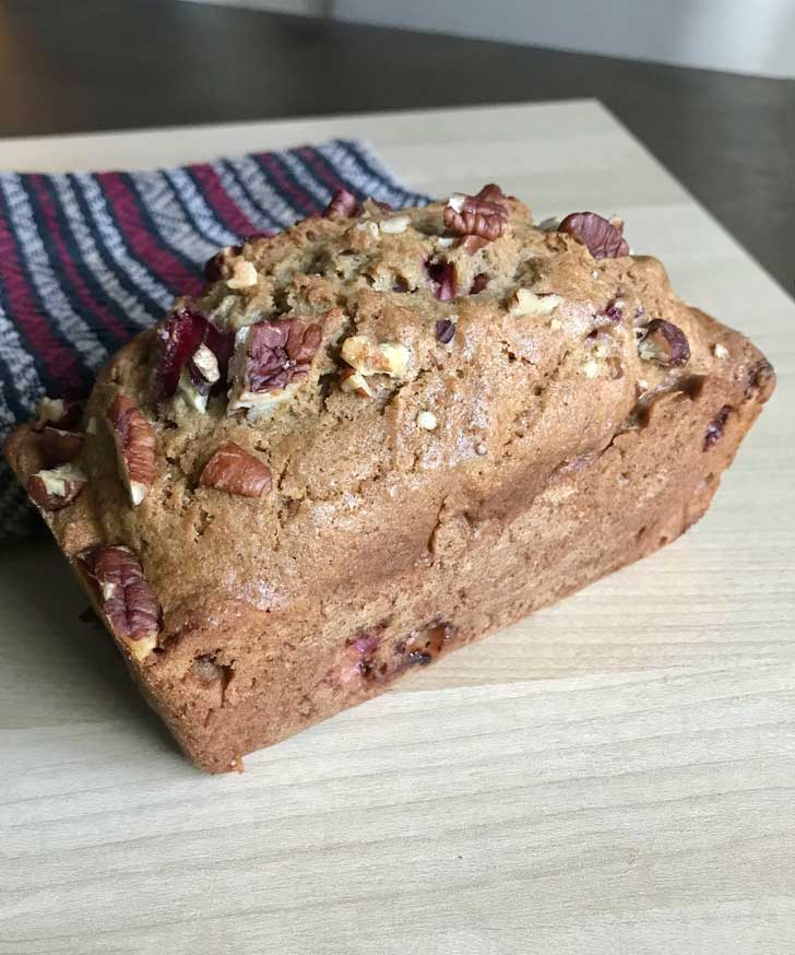 Olive Oil Strawberry Bread baked in a mini loaf pan.