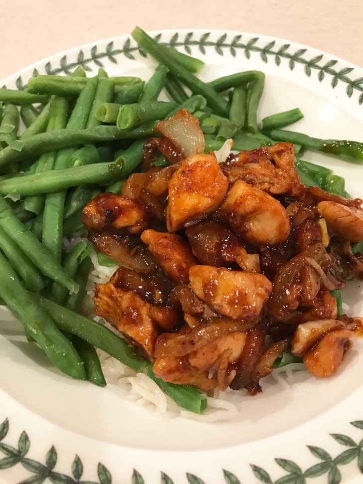 Sriracha-Glazed Chicken and Rice on a Portmeirion plate.