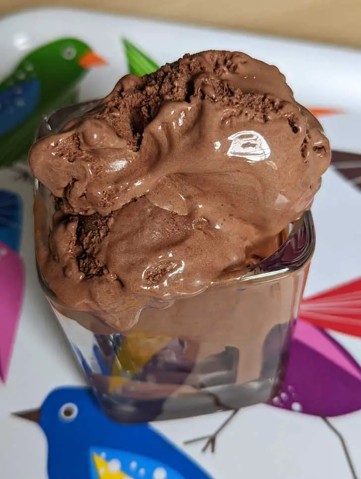 A scoop of chocolate gelate made with whole milk and evaporated milk.