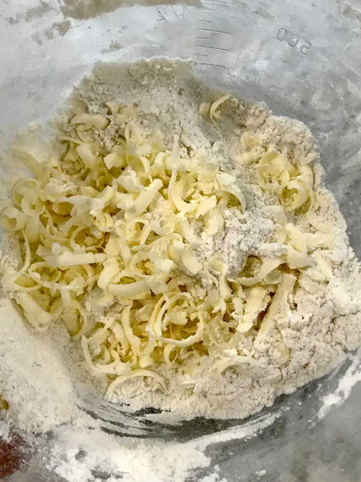 St. Patrick's Day butter grated into flour mixture.