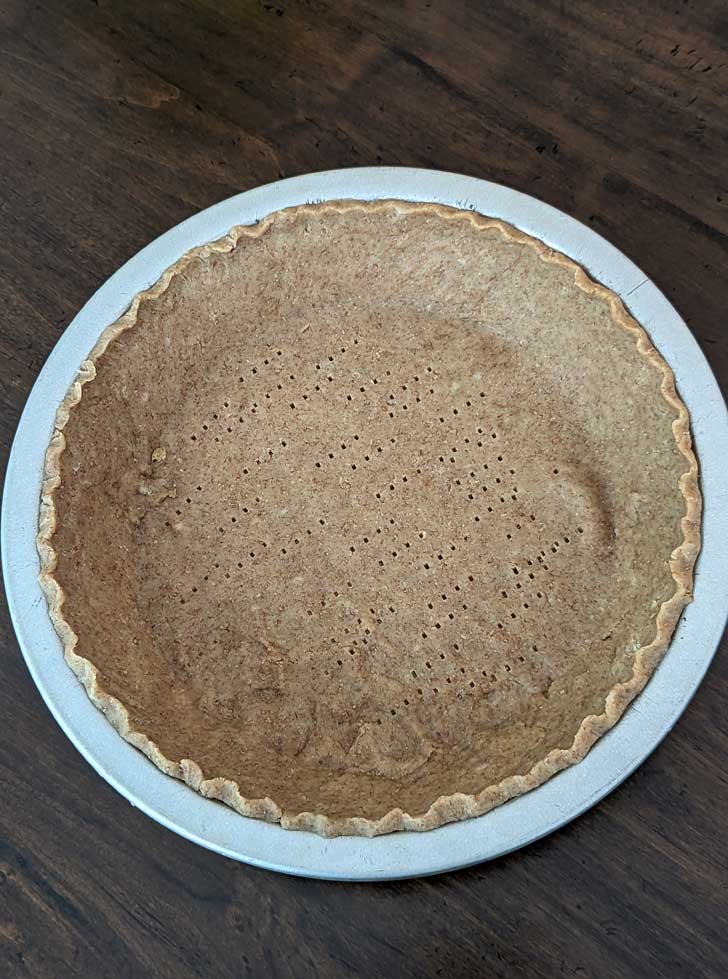 Unbaked rolled graham cracker pie shell.