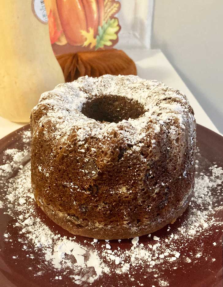 Applesauce Chocolate Chip Cake in a six inch fluted pan.