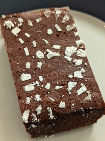 Slice of flourless chocolate cake based on Alfred Portale's Gotham Grill recipe