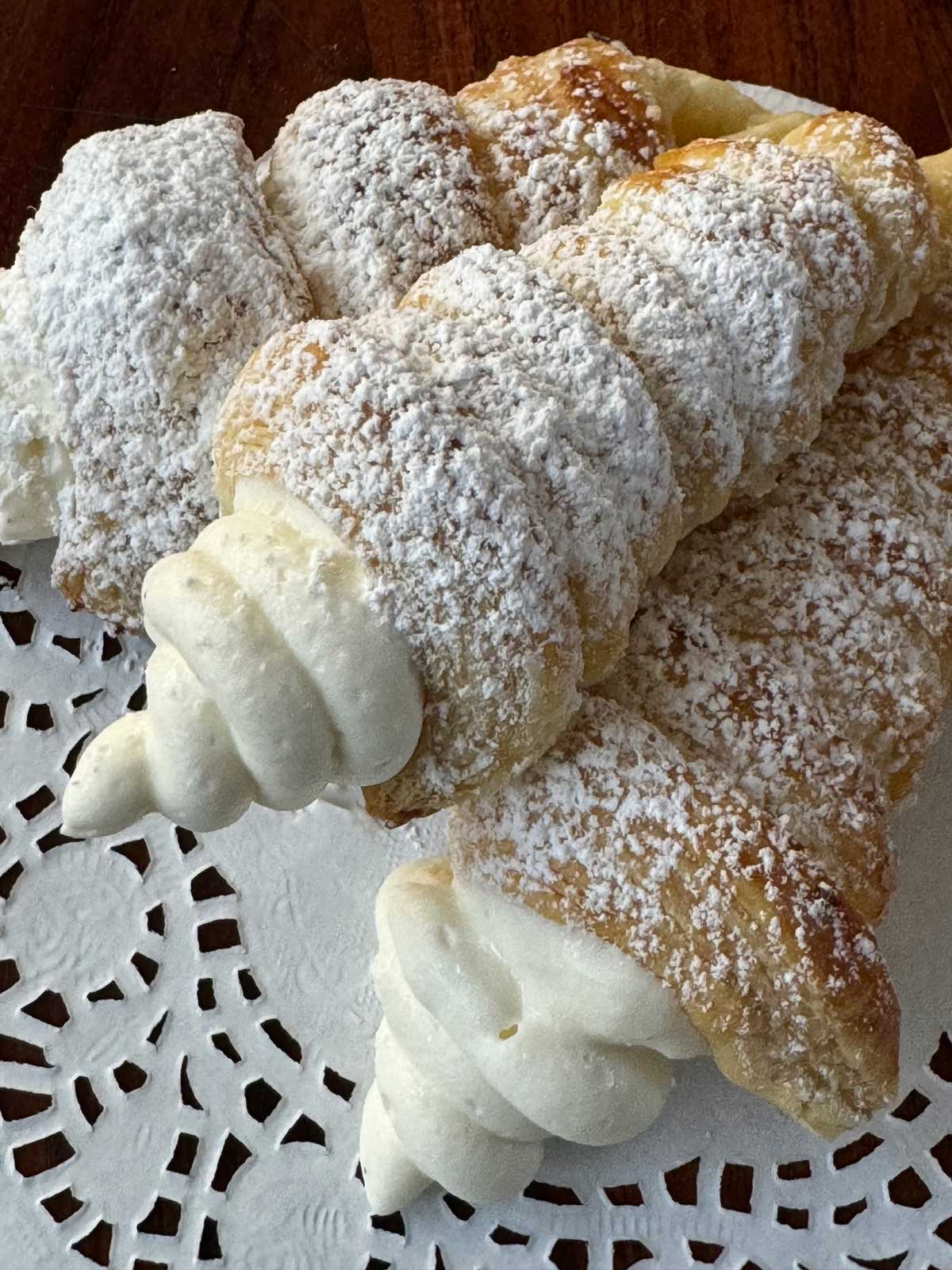 Easy Puff Pastry Cream Horns with a whipped white chocolate ganache