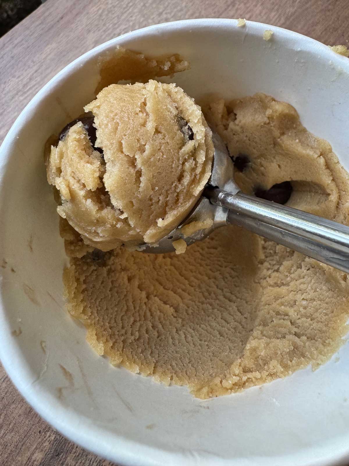 Scooped dairy free chocolate chip cookie dough.