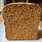 Slice of Anadama Bread cut to show texture.