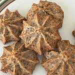 Filbert Macaroons, also known as Hazelnut Macaroons, piped with a star tip.
