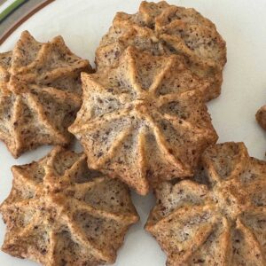 Filbert Macaroons, also known as Hazelnut Macaroons, piped with a star tip.