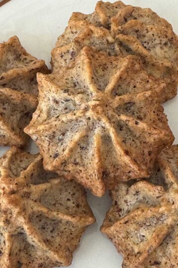 Filbert Macaroons, also known as Hazelnut Macaroons, piped with a star tip.
