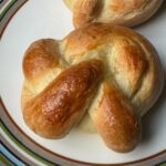 A homemade egg knot roll with an easy recipe for how to make them.