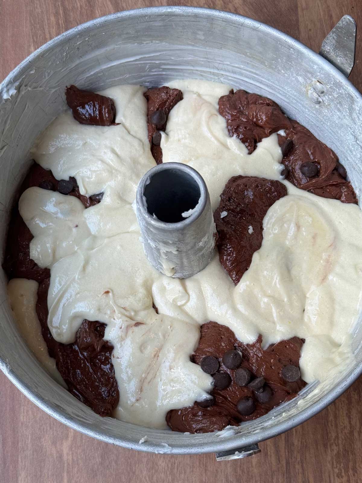 Batter for The Settlement Cookbook Marble Cake in a tube pan.