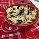 Baked Wild Rice For One in an individual size lidded pot