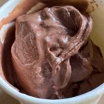 An easy recipe for low calorie chocolate frozen yogurt with allulose powder.