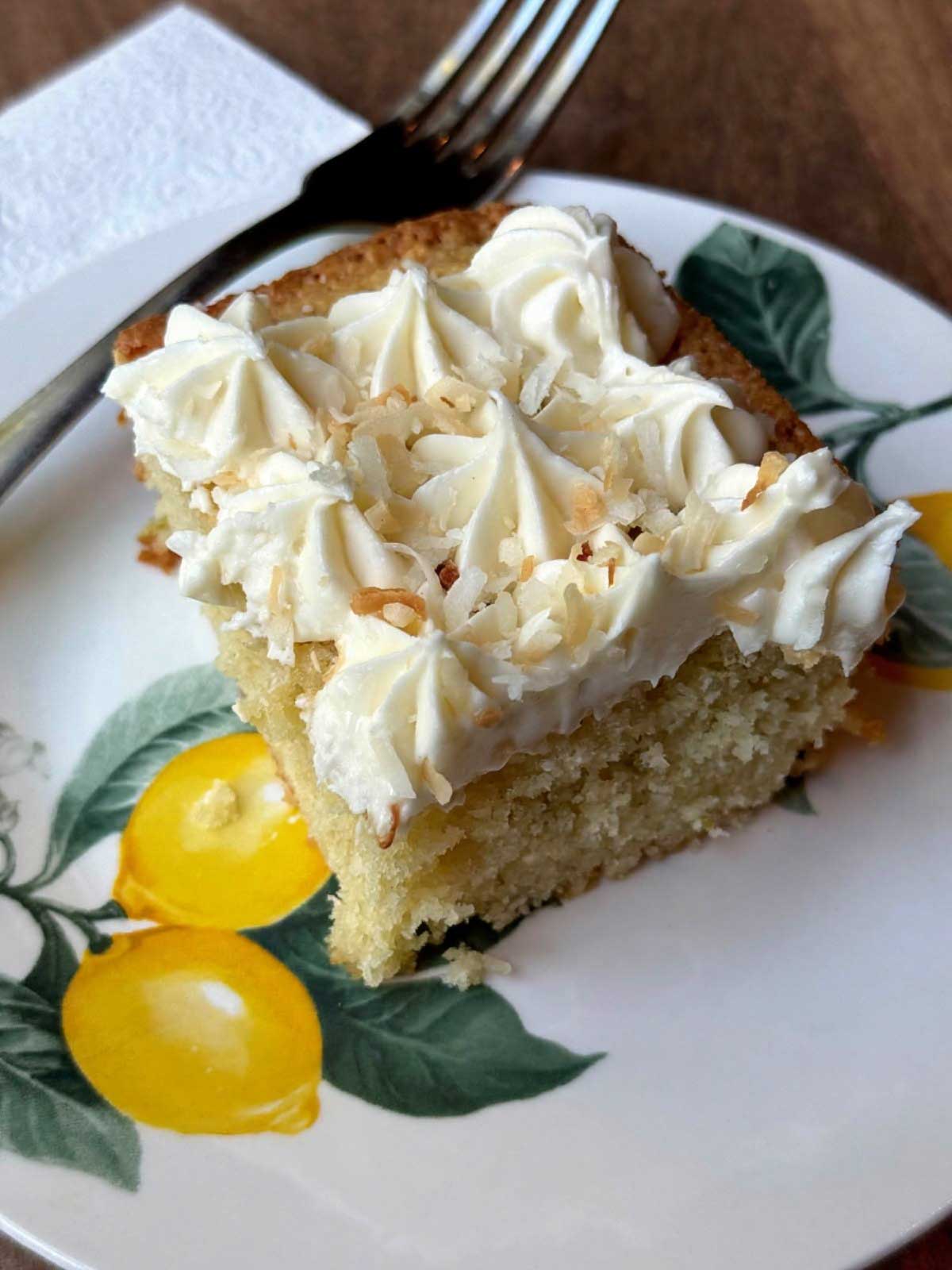 Slice of frosted Key lime snacking cake recipe.