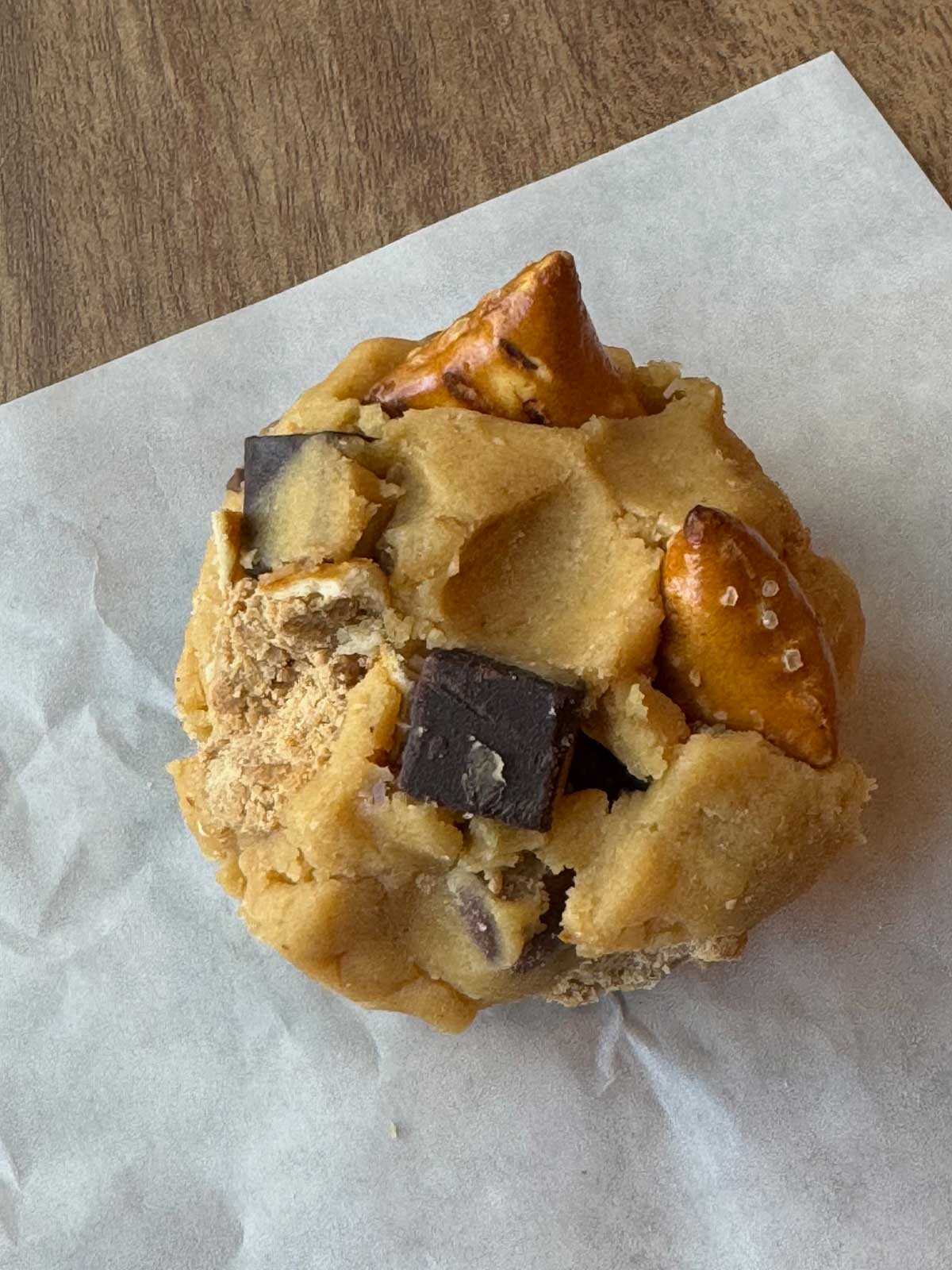 Giant ball of peanut butter chocolate chunk pretzel cookie dough.