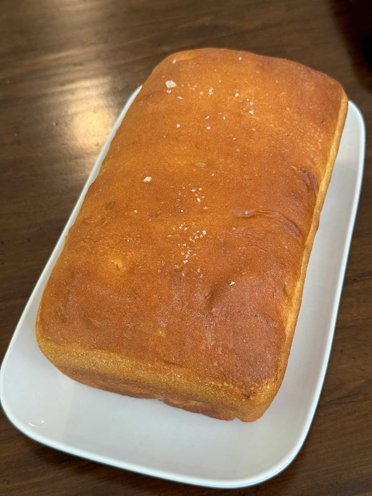 Leftover mashed potatoes baked into a 9x5 inch loaf of sandwich bread.