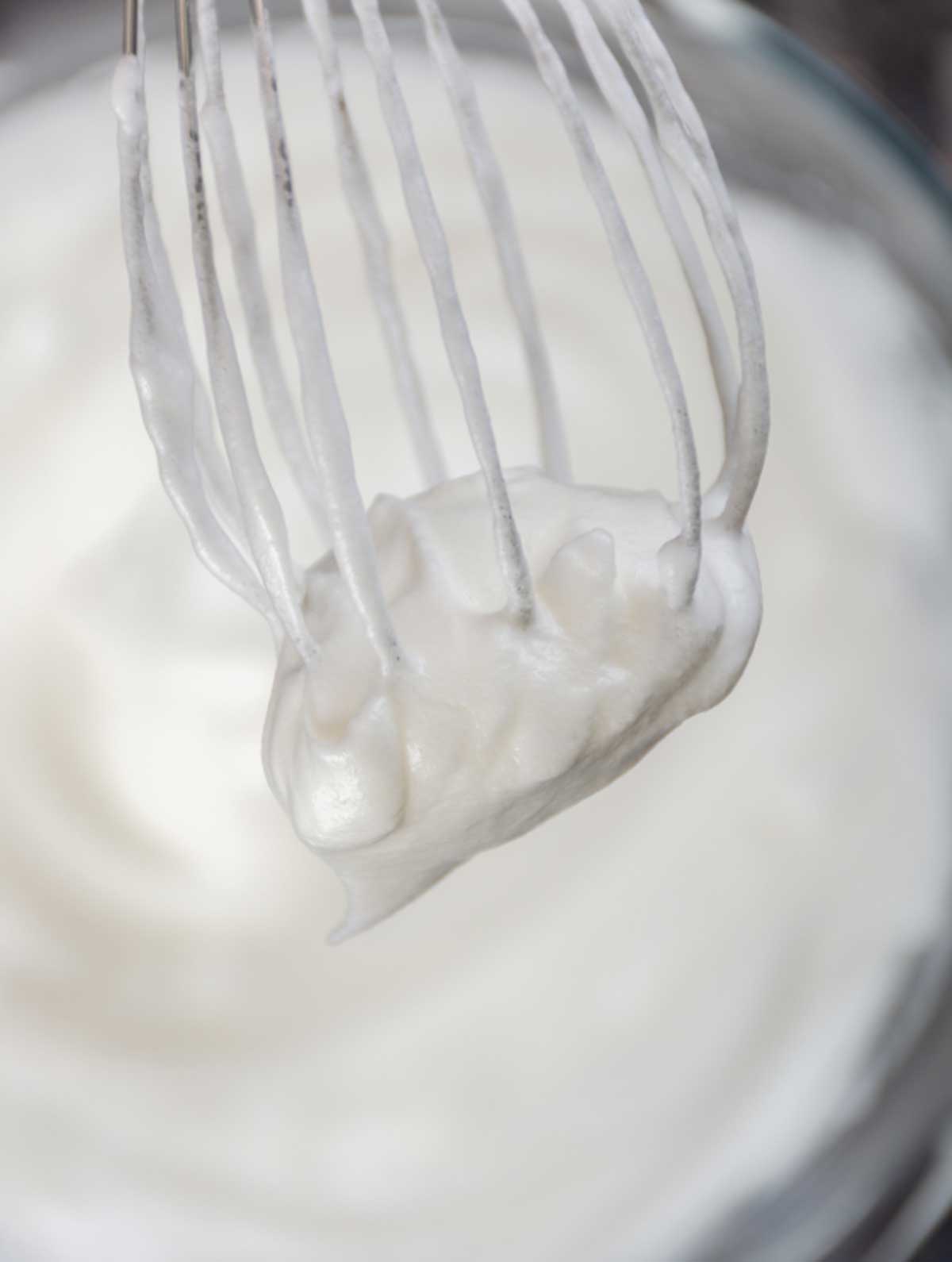 Egg whites whipped to soft peaks for pumpkin waffles.