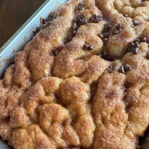 Moravian Sugar Cake or Cardamom Bun Cake with a wavy, wrinkled top.