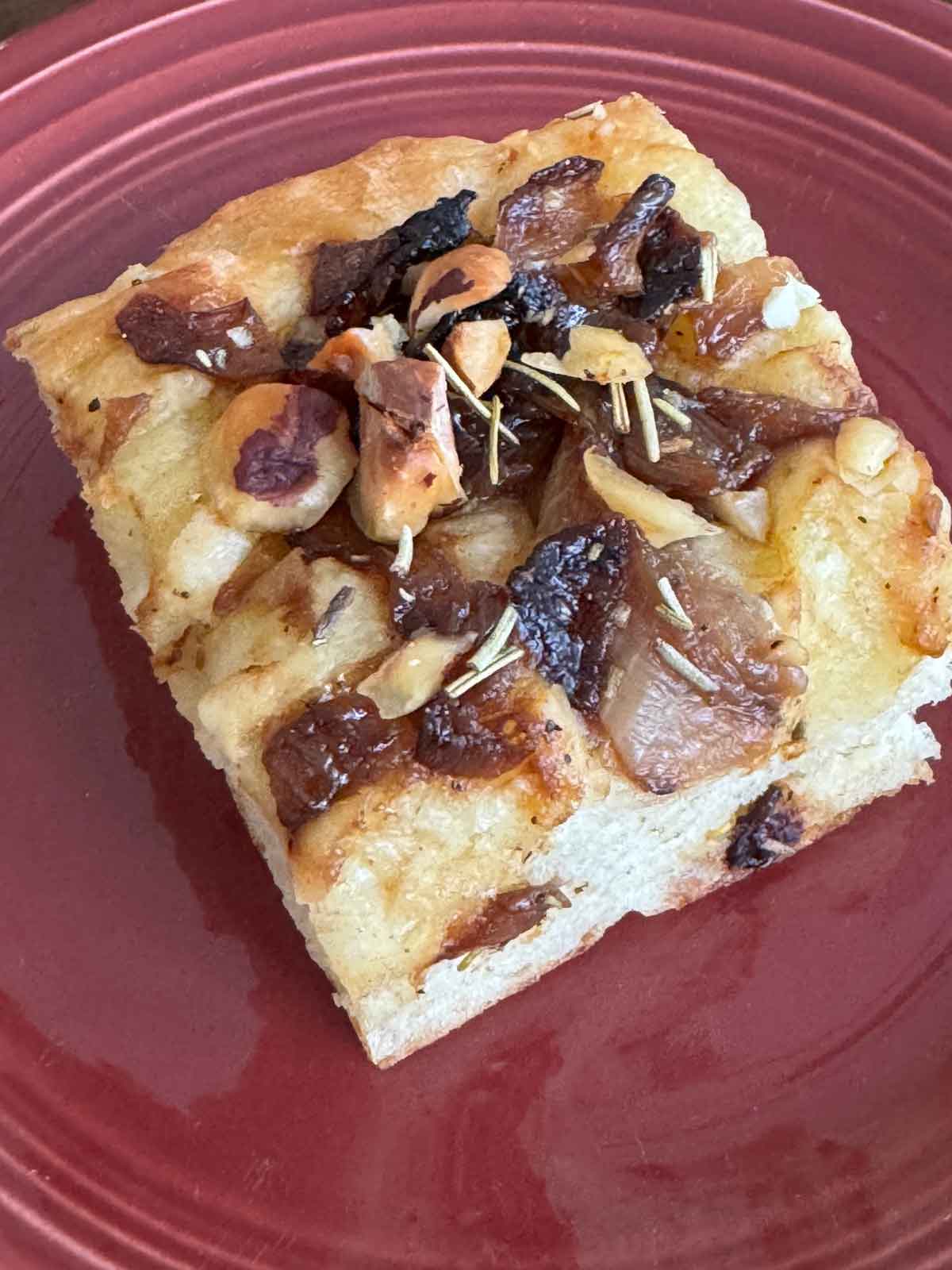 A square of hazelnut caremelized onion focaccia