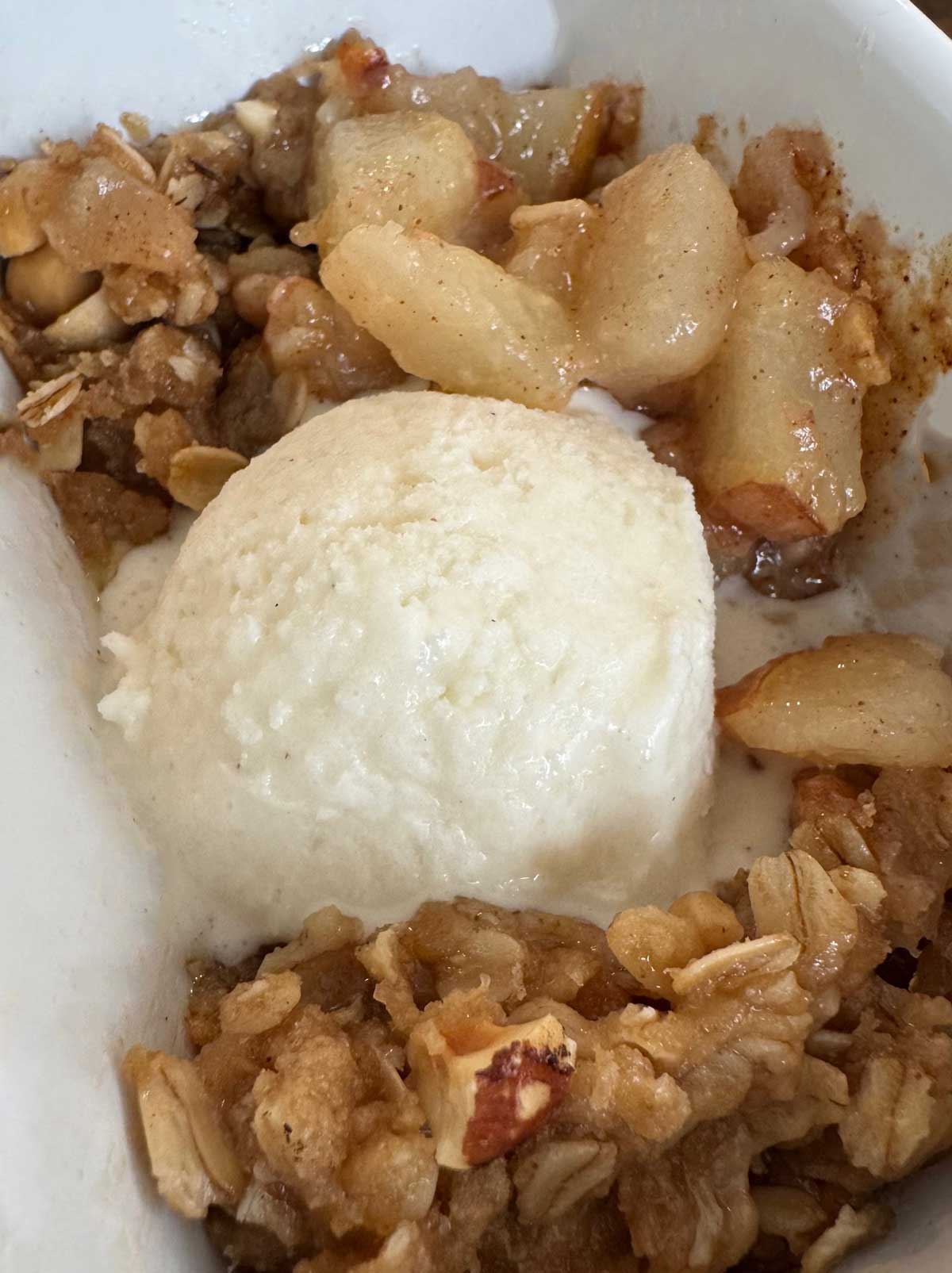 Recipe for Small Batch Pear Crisp or Crisps served with a scoop of  vanilla ice cream.