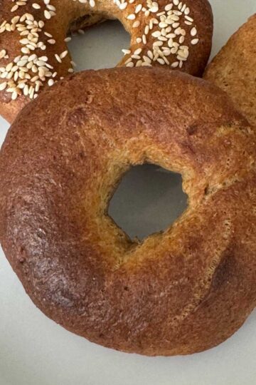 Bran Bagel made with All Bran cereal on a plate.