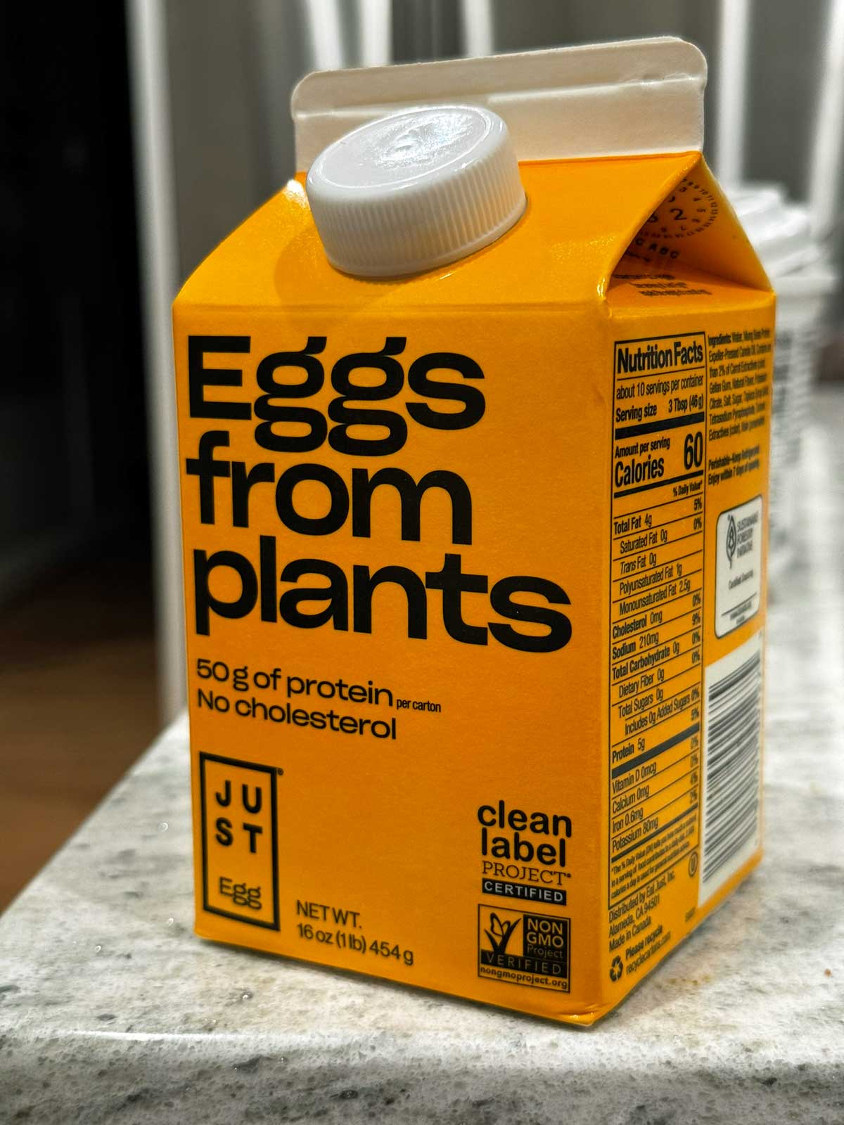 A carton of Just Egg, Egg from Plants to be used in a basic vegan pumpkin bread recipe.