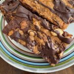 Flourless Chocolate Peanut Butter Bars on a plate.