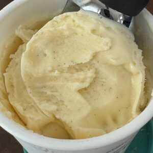 Vanilla ice cream made with allulose and high protein milk.