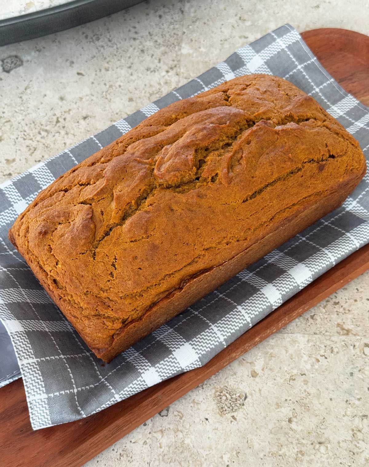 Loaf of vegan pumpkin bread made with Just Egg egg replacer.