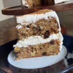 Amazin' Raisin Cake frosted with cream cheese stabilized whipped cream and cinnamon
